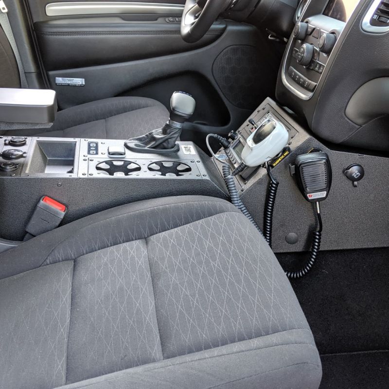 Consoles in police vehicle