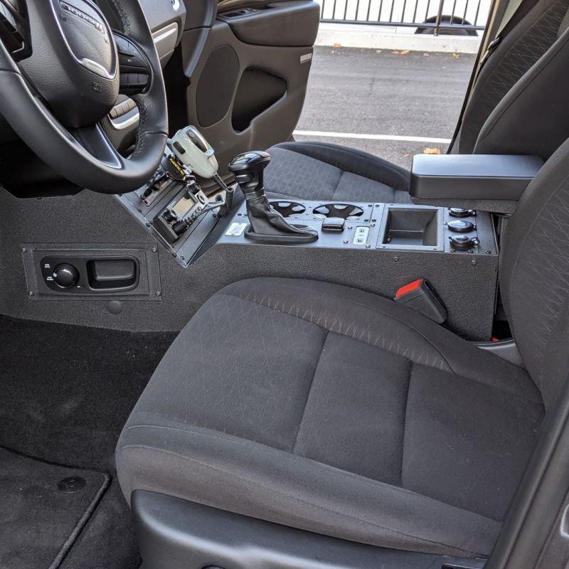Consoles in police vehicle