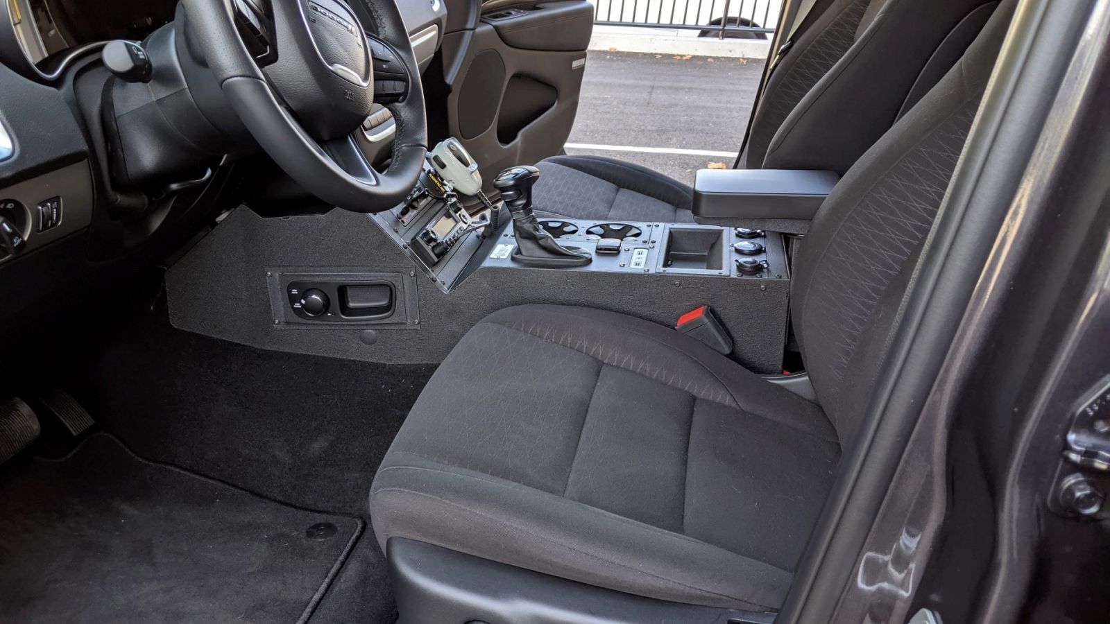 Consoles in police vehicle